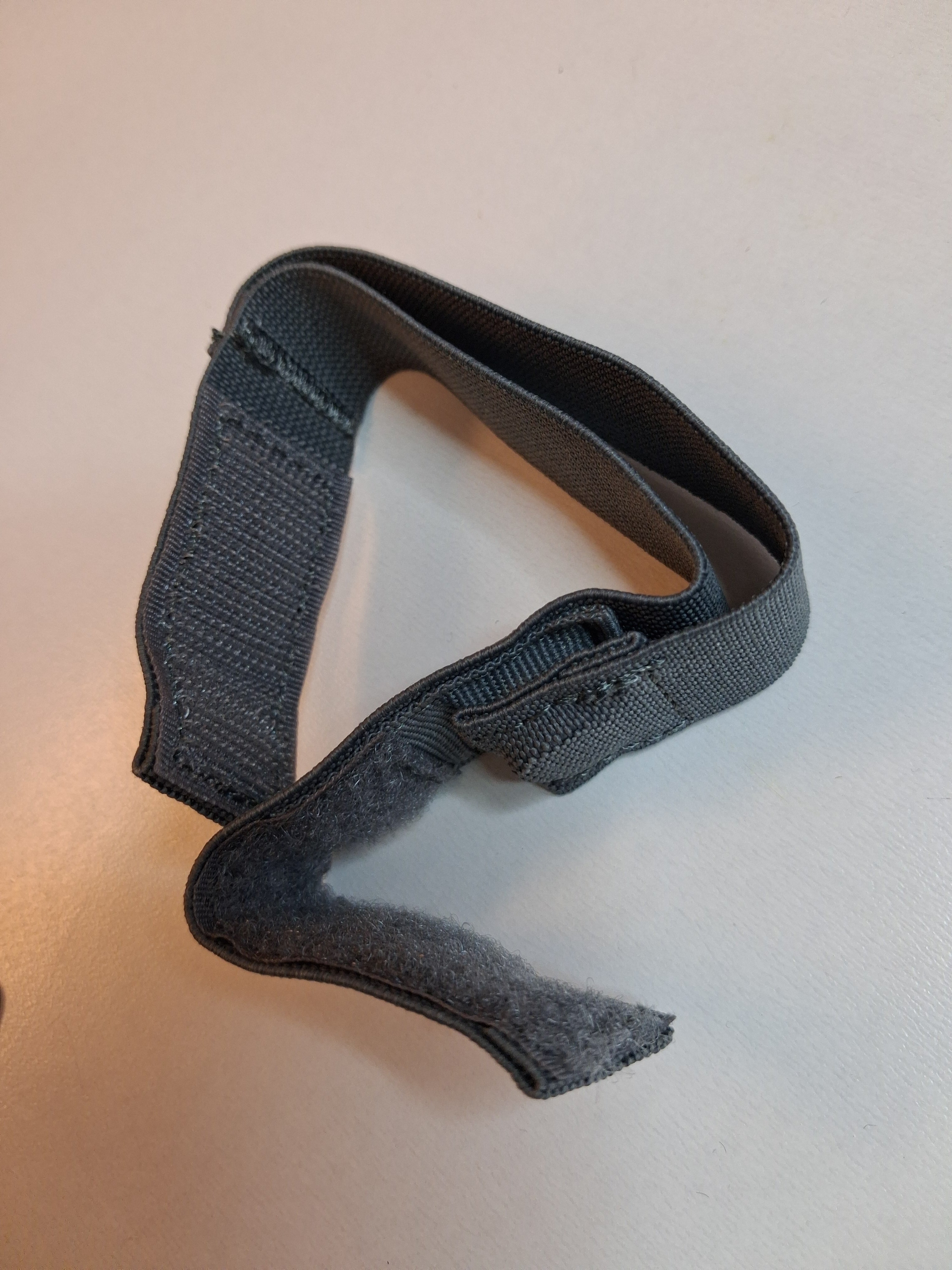 Magneettinen hihnanpidike