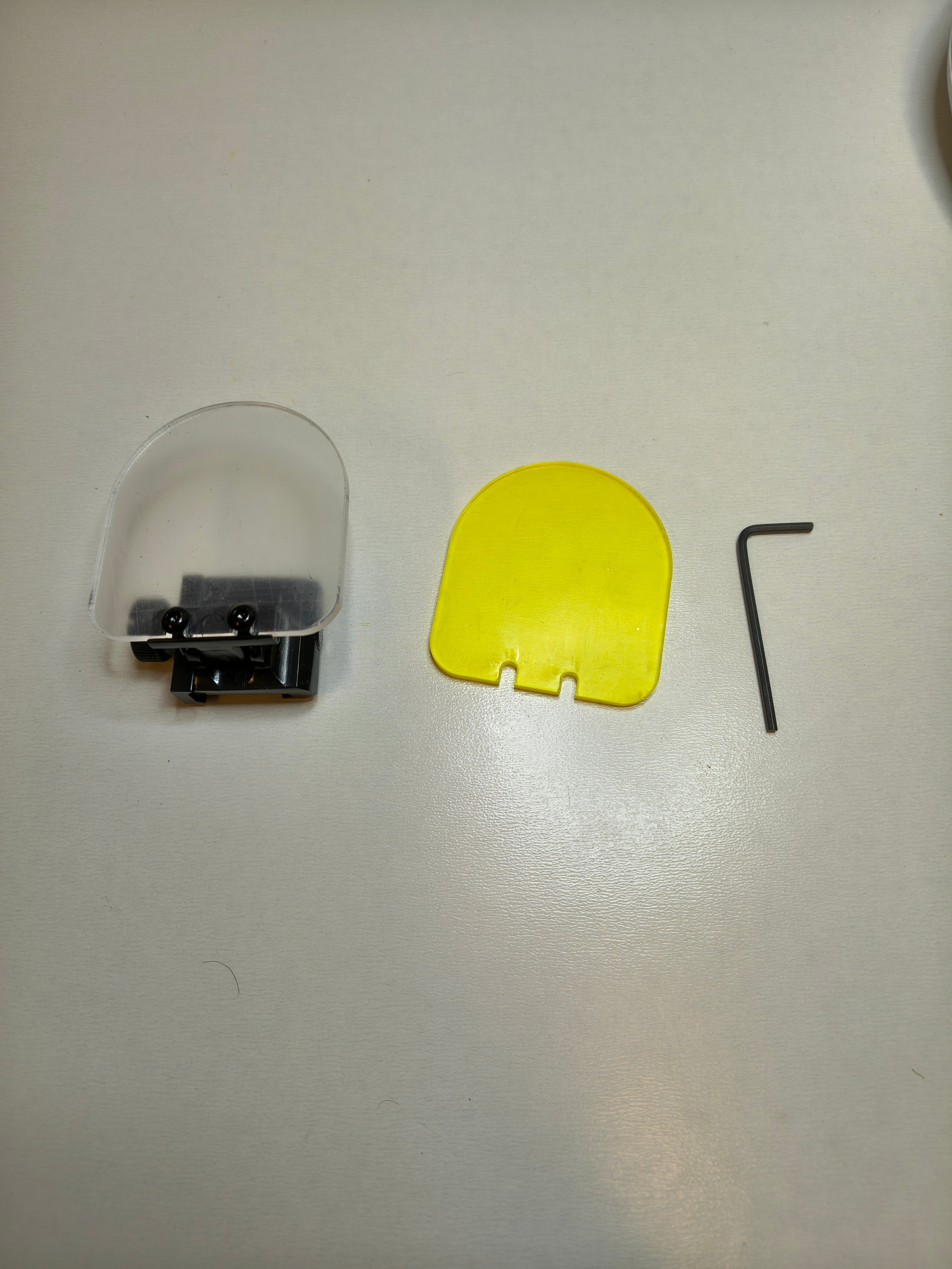 Linssisuoja ris kiinnitys taittuva